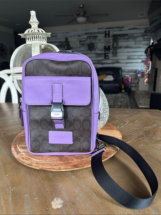 Coach Handbags - Coach Brown Signature Canvas Messenger Bag with Purple Trim